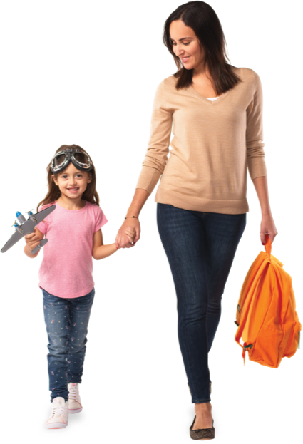 Abigail holding a model airplane and her mother's hand
